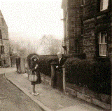 Anne and Grandad Wheeldon outside his home near the Turnpike